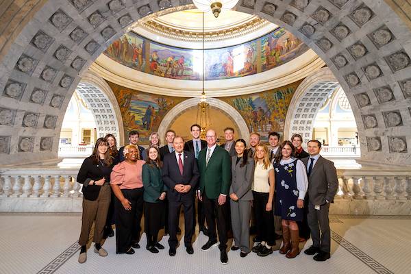 2026 Cohort of UVU Legislative Interns at the Capitol Building with Justin Jones and Gov Herbert 2026 Cohort of UVU Legislative Interns at the Capitol Building