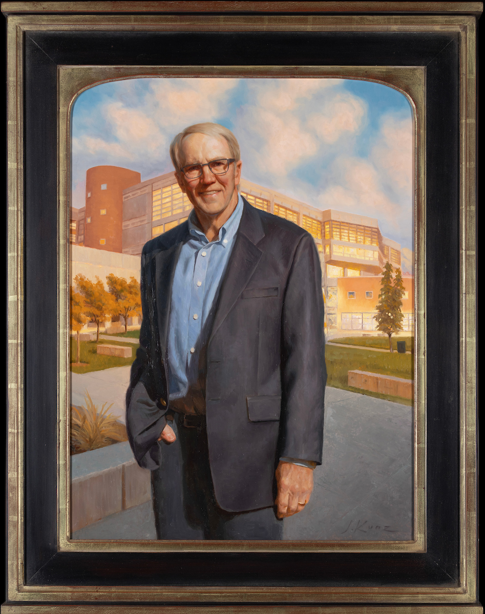 Portrait of William A. Sederburg, painted by Justin Kunz. In the portain Sederburg is depicted as smiling while standing in front of the Fulton Library.