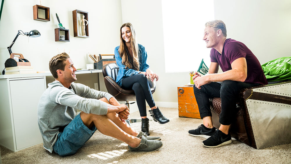 a family talking in a student apartment