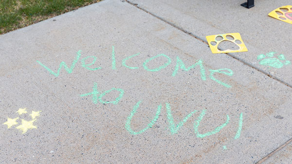 Welcome to UVU chalked on a sidewalk