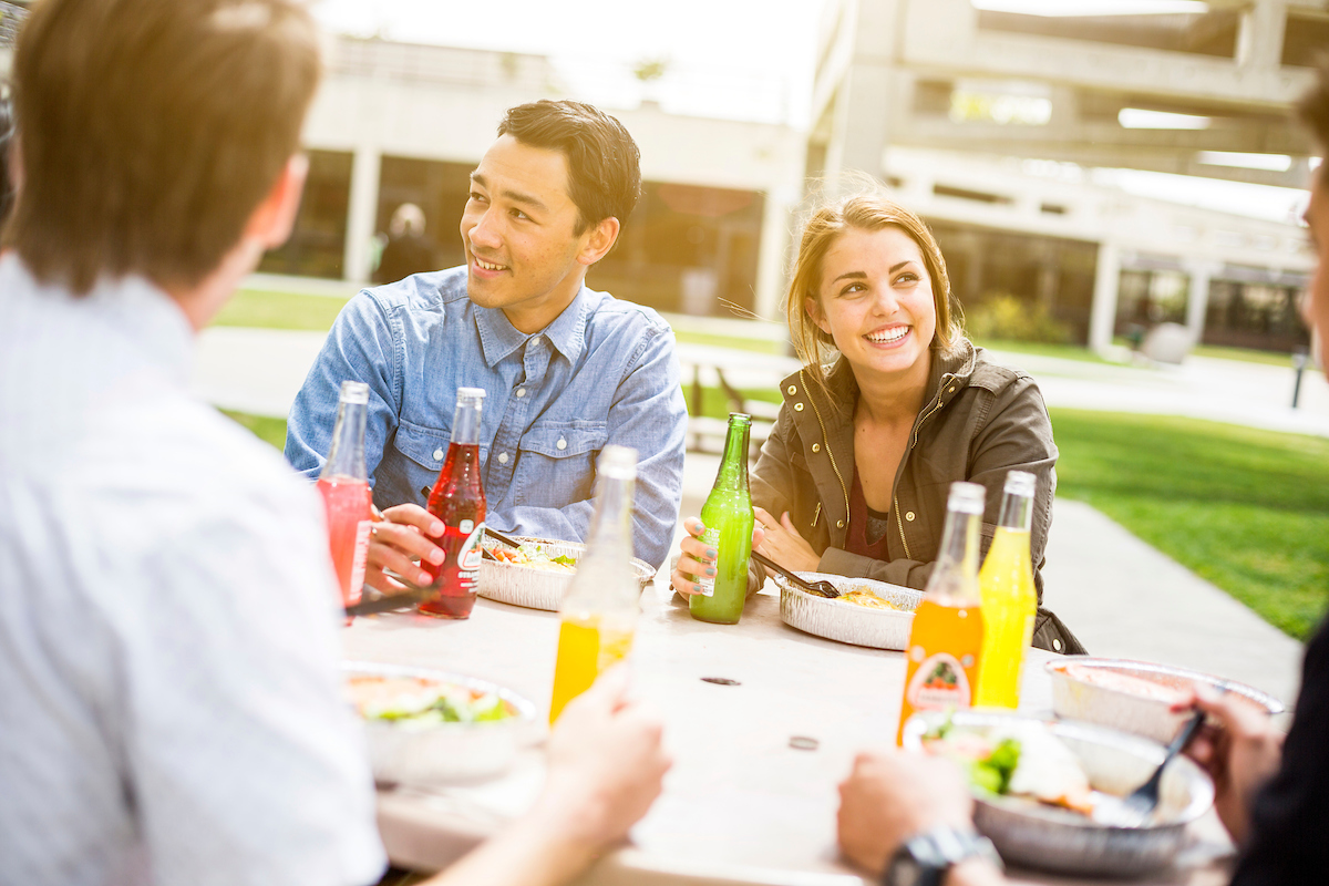 Image of students having lunch outside UVU campus