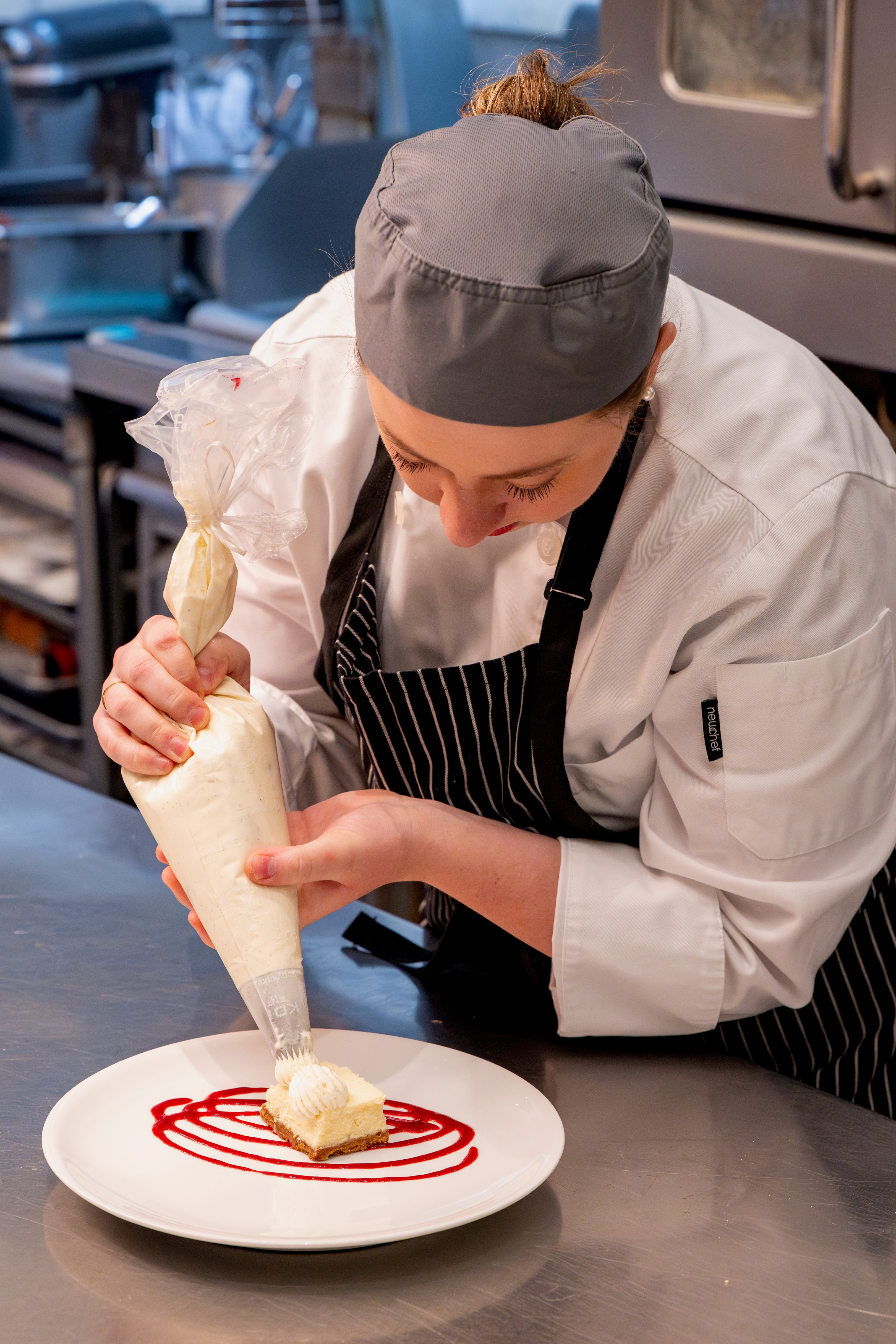 picture of Hillary working on a pastry dish