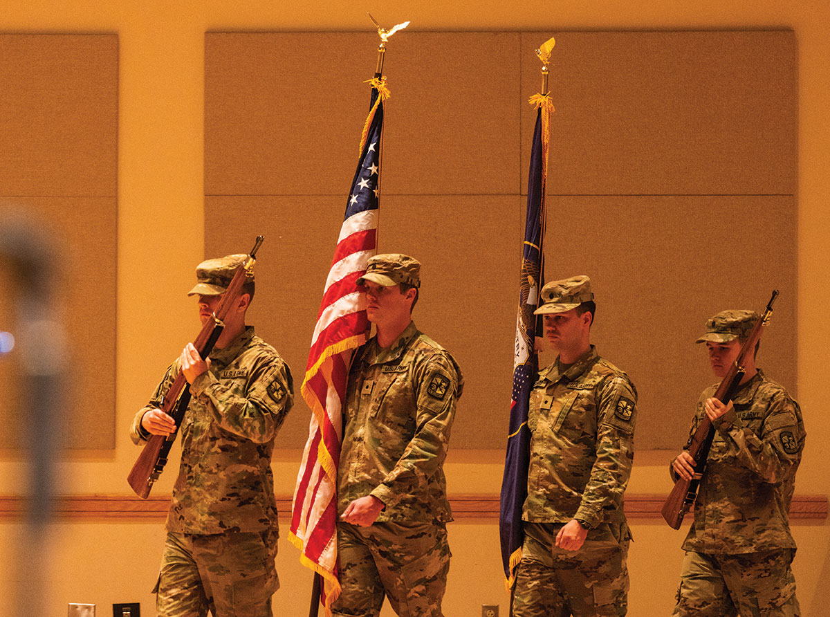 UVU ROTC students carry the United States flag and the Utah state flag during a Veterans Day breakfast event hosted by the UVU Veteran Success Center in November 2022. 
