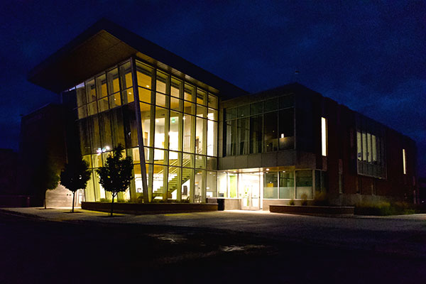 Exterior of UVU autism building at night