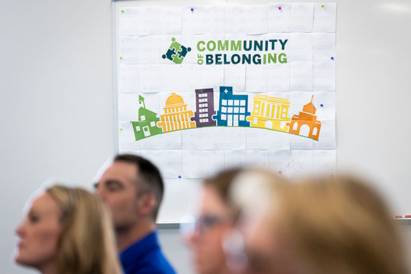 image focused on a banner labeled community of belonging