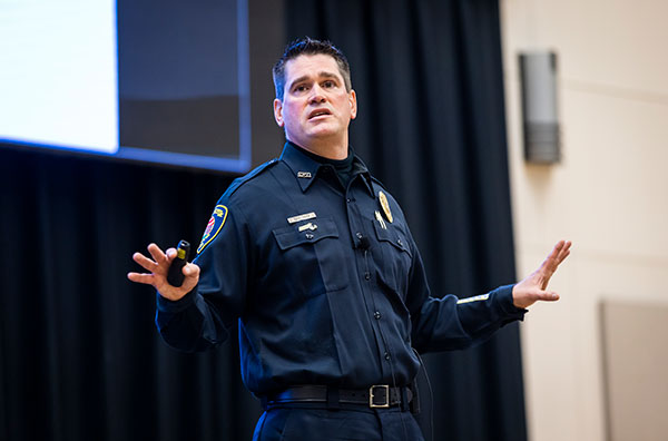 Image of a policeman presenting