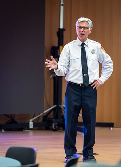 Image of a man presenting at an event