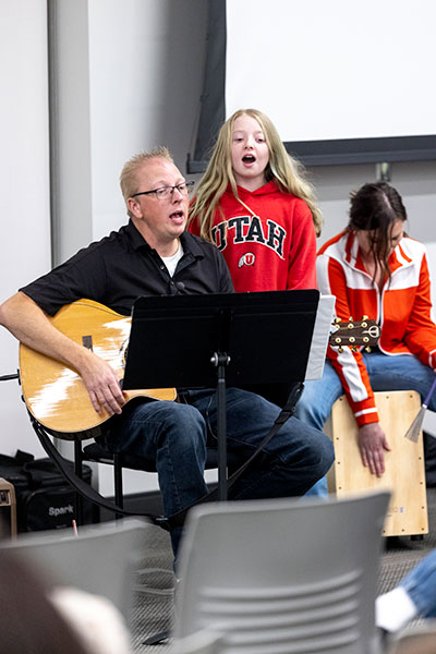 A band made up of a dad and 2 girls