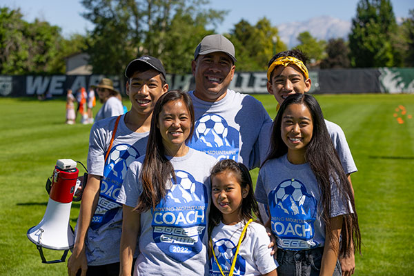 soccer family posing for the camera