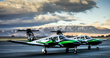 two planes on a runway