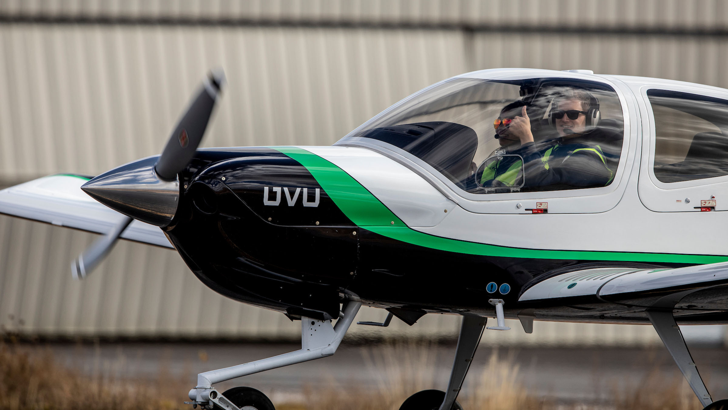 Plane with two pilots about to takeoff