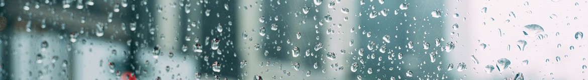 a window covered in rain drops