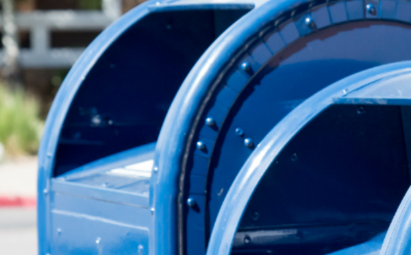 two blue mailboxes