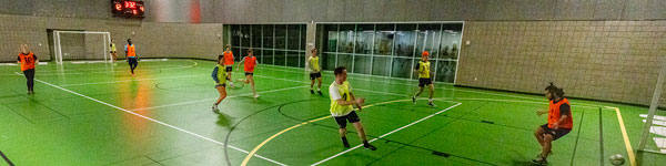 An intramural indoor soccer game