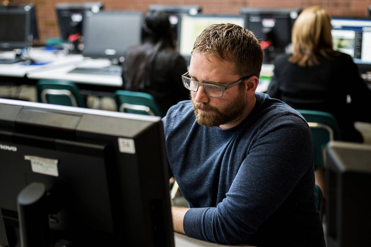 student looking at computer