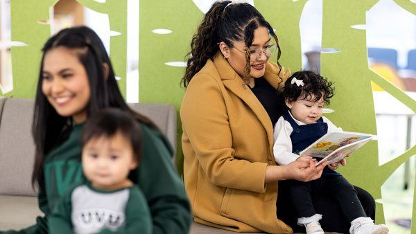 Happy childcare providers with children