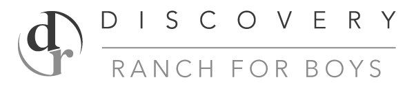 Discovery Ranch for Boys logo