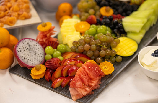 plate of fruit and cheese