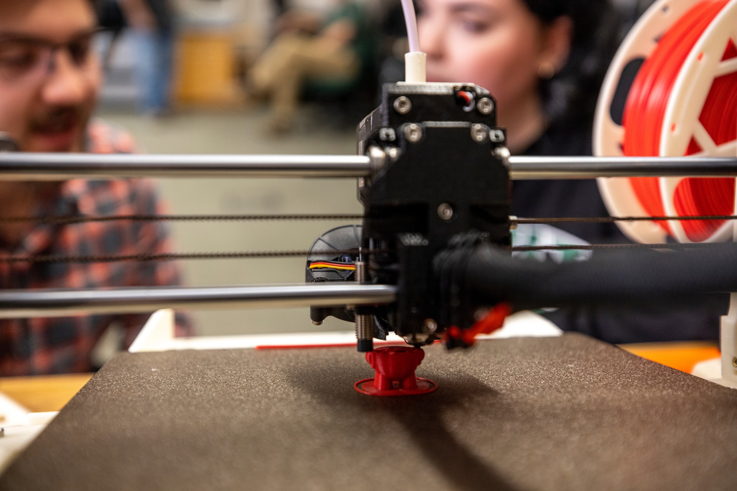 closeup of a 3D printer printing an object