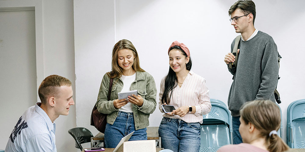 group of students gathered around a table