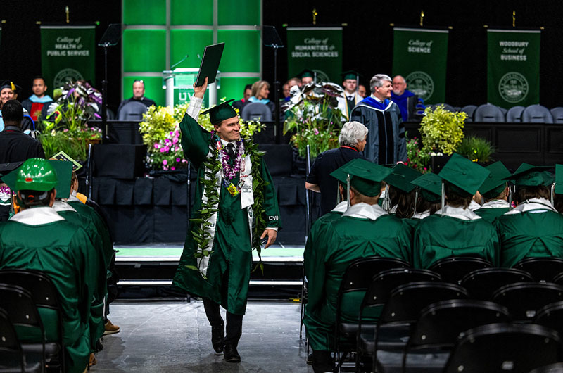 graduate with diploma