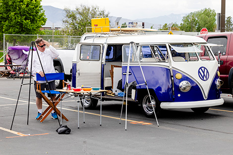Man standing by vintage Volkswagen bus