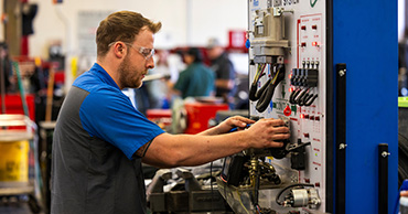 man using a large machine