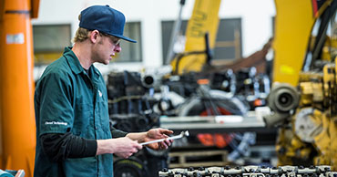 man holding a wrench