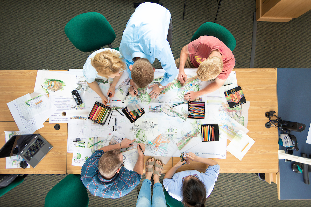 Above view of some people sitting at a table