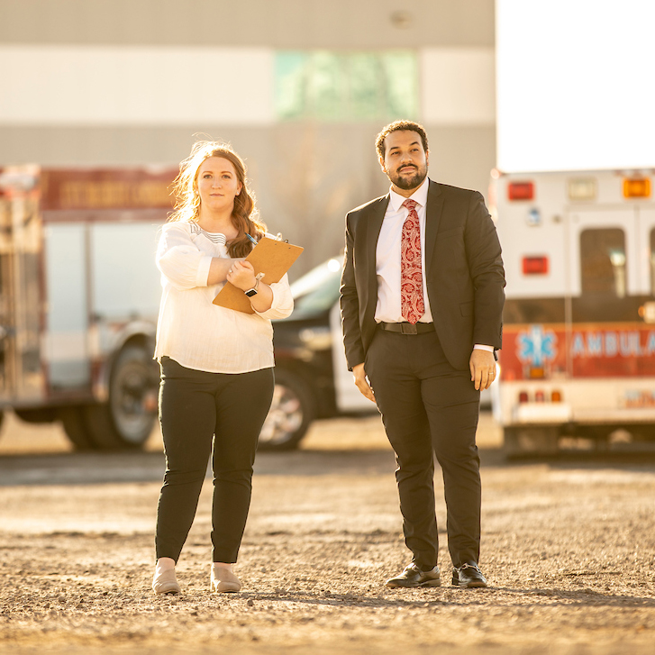 Man in a suit and woman in dress clothes