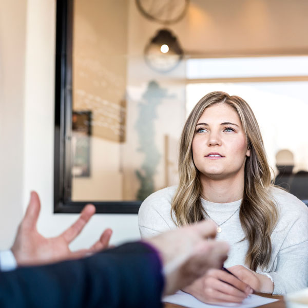 A student in a serious conversation