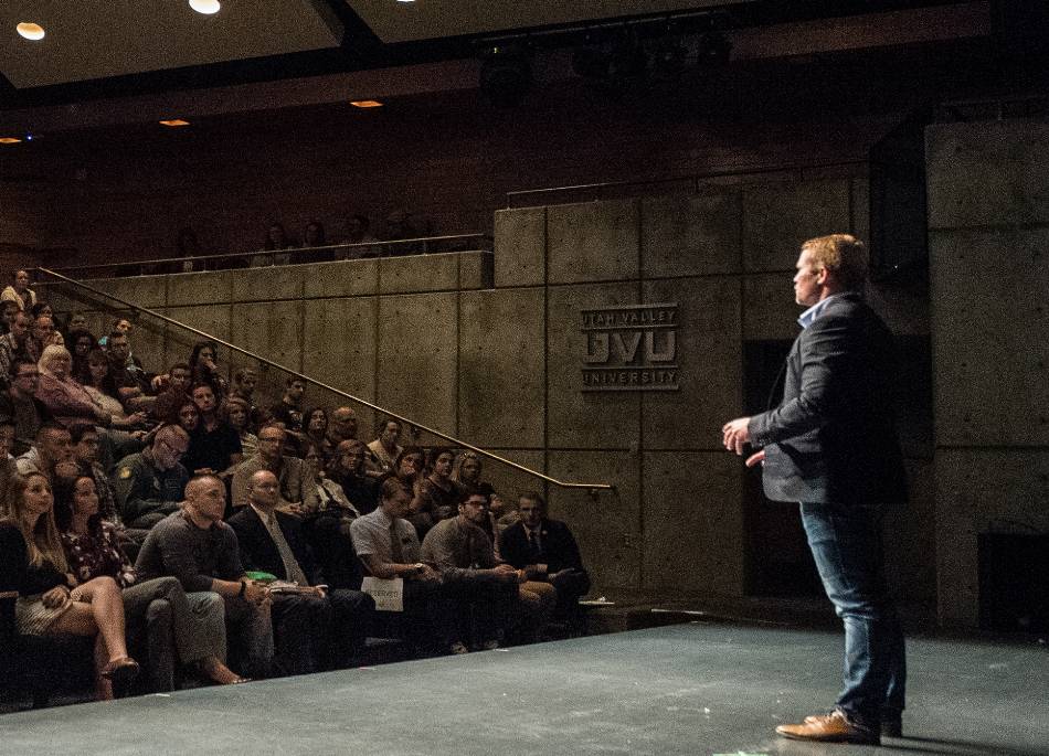 a speaker talking to students