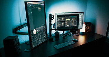 a computer with two external monitors