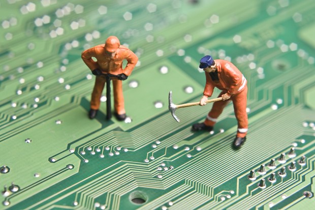 circuit board with construction workers