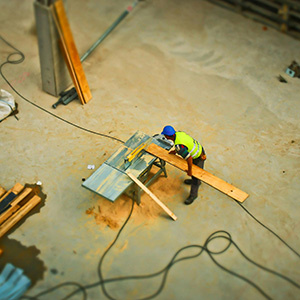 overhead view of man working with construction equipment