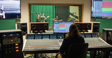 person in a sound recording studio