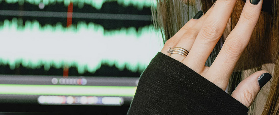 person listening to audio on headphones