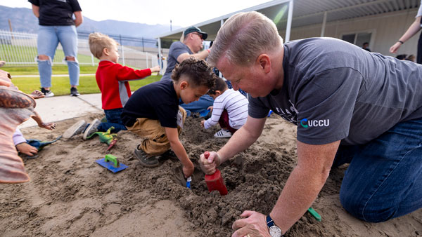 Staff playing with children