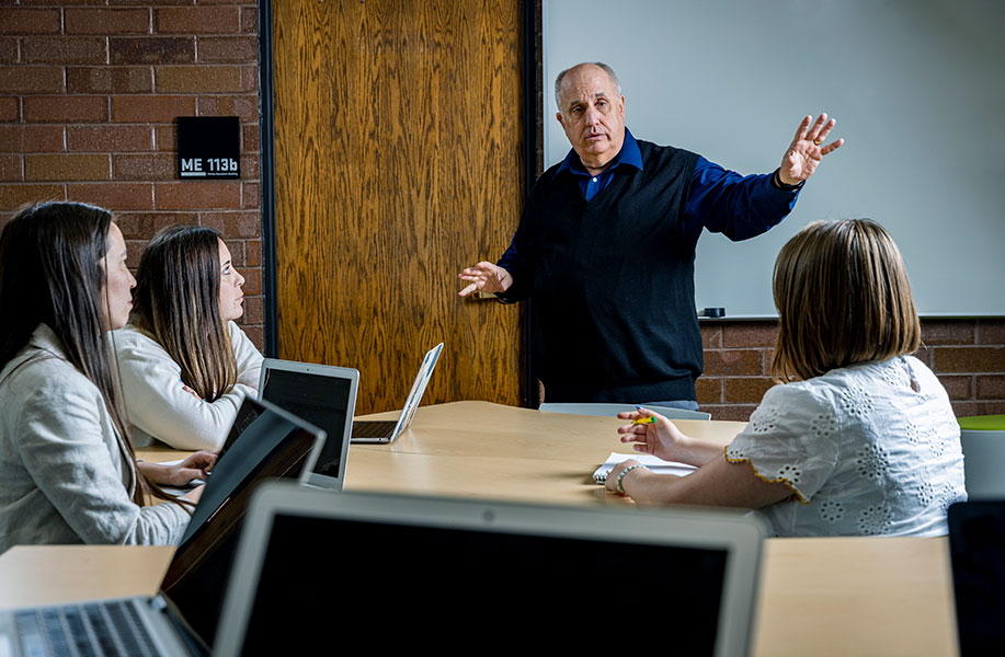 Image of a Graduate Program Professor teaching a class