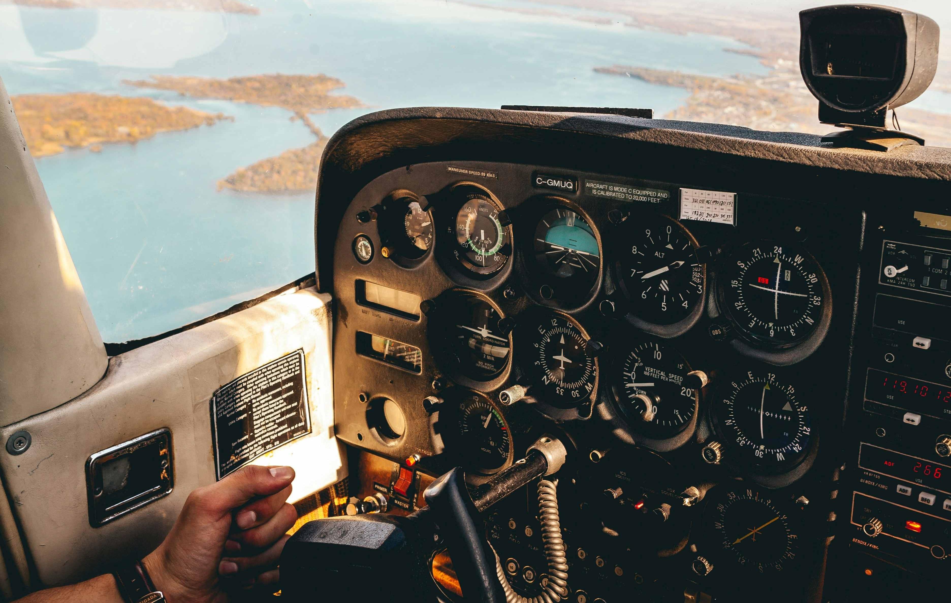 Photo by William Topa Unsplash image shows the interior console of an airplane