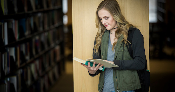 Student reading book