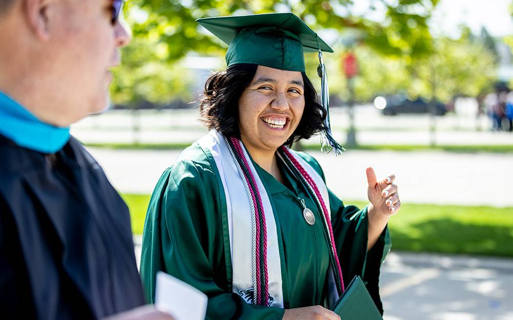 graduate student talking with professor