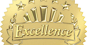 Embossed gold sticker that says Excellence