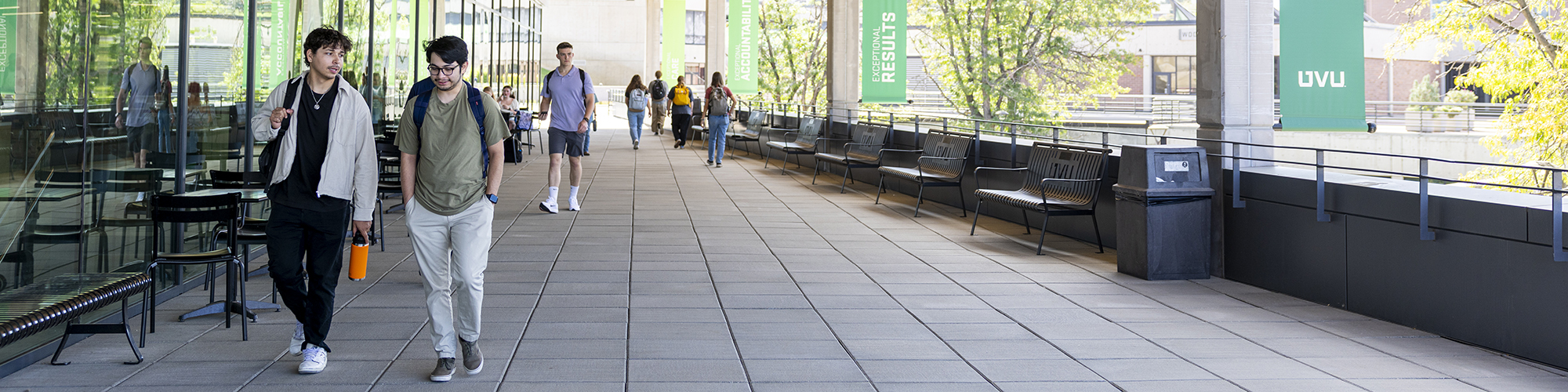 UVU First-Gen Students walking on outside walkways