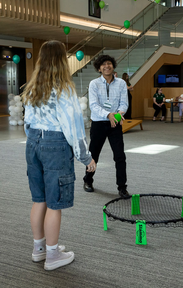 UVU Students participating in a club activity - spike ball