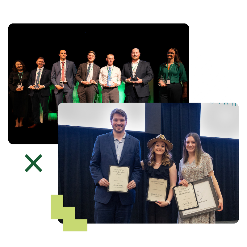 Photo of group of students holding various awards on a stage