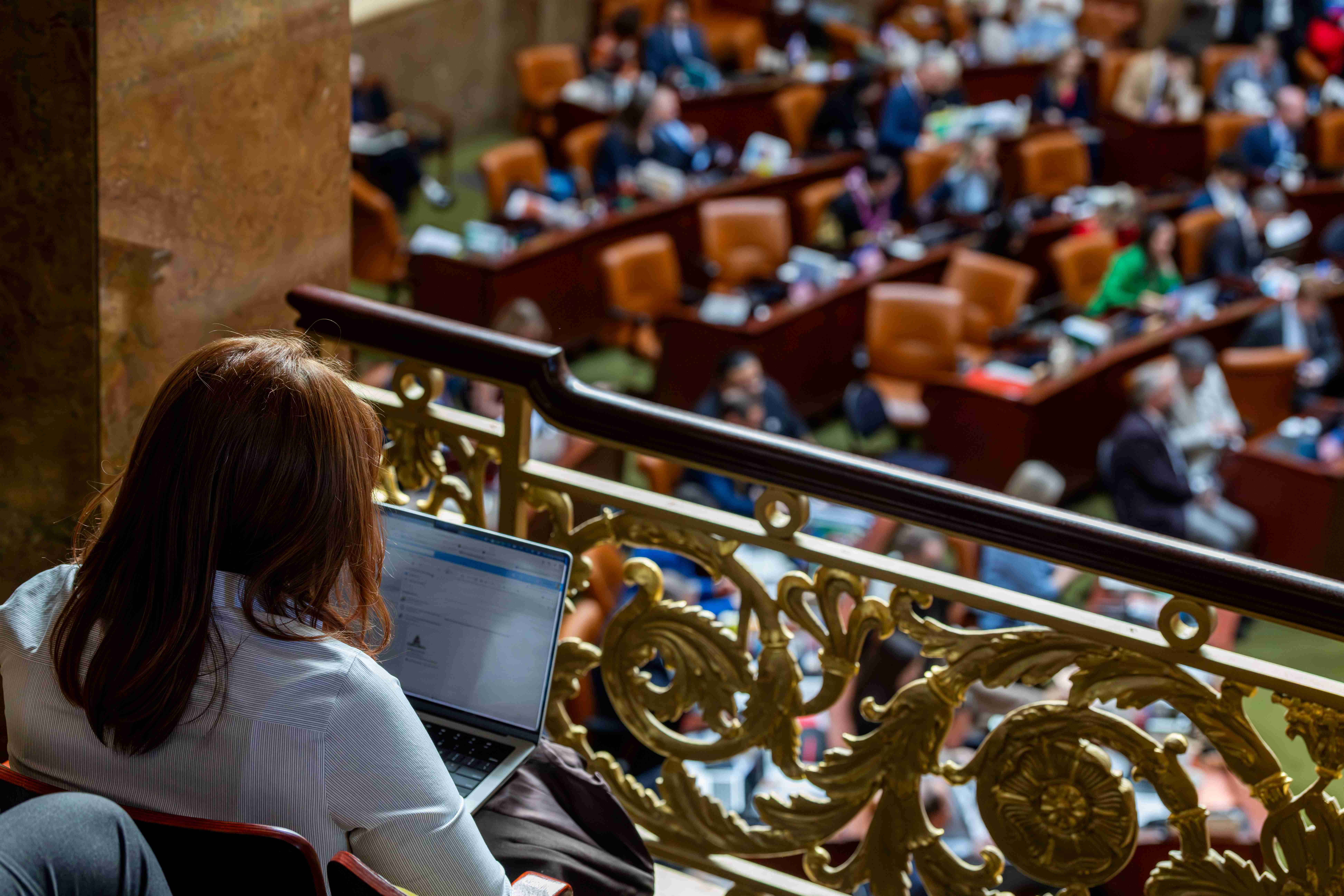 Legislative intern taking notes