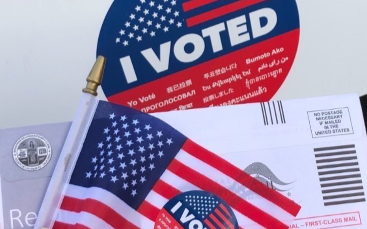 Ballot, American flag, and I Voted sticker