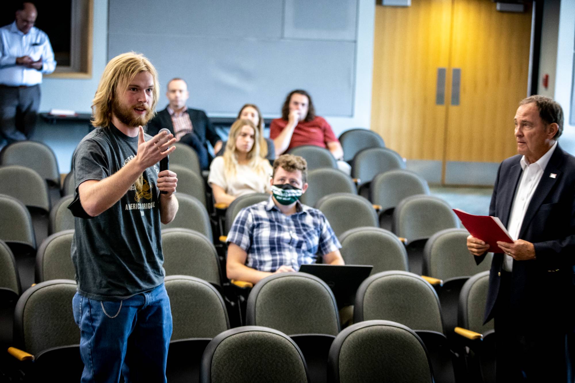 Photo of a student asking a question at the Paul Ray Lecture