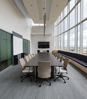empty conference room with a table and chairs